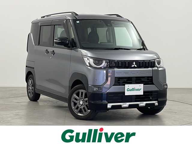 三菱 デリカミニ T プレミアム 群馬県 2024(令6)年 1万km グレー ９型ナビ　全周囲カメラ　電子ミラー　マイパイロット　パドルシフト　ハーフレザーシート　シートヒーター　ステアリングヒーター　ハンズフリーオート両側電動スライドドア　ビルトインＥＴＣ　前後ドラレコ　禁煙