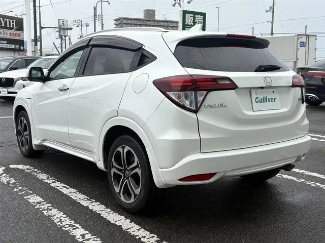 ホンダ ヴェゼル ハイブリッド Z 徳島県 2015(平27)年 7.8万km ホワイトオーキッドパール 純正８型ナビゲーション/（フルセグ/CD/DVD/SD/Bluetooth）/衝突軽減被害ブレーキ/バックモニター/ＥＴＣ/ハーフレザーシート/クリアランスソナー/LEDヘッドライト/フォグランプ/パドルシフト/カーテンエアバック/電気式パーキングブレーキ/オートホールド/プッシュスタート/スマートキー/スペアキー/革巻きステアリング/電動格納ミラー/オールオートパワーウインドウ/ステアリングリモコン/純正フロアマット/サイドバイザー/リヤワイパー/室内LEDランプ