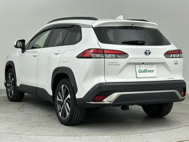 トヨタ カローラ クロス ハイブリッド Z 道央・札幌 2022(令4)年 1.4万km プラチナホワイトパールマイカ ・ワンオーナー/・４WD/・パノラマルーフ/・純正ディスプレイオーディオ/　BT/USB/Miracast/フルセグ/・パノラミックビューモニター/・ビルトインETC/・前後ドライブレコーダー/・トヨタセーフティセンス/・プリクラッシュセーフティ/・レーダークルーズコントロール/・レーンキープアシスト/・オートハイビーム/・クリアランスソナー/・BSM/・RSA/・RCTA/・パワーバックドア/・ハーフレザーシート/・前席シートヒーター/・D席パワーシート/・LEDヘッドライト/・フォグライト/・オートライト/・プッシュスタート/・スマートキー/・純正フロアマット/・ドアバイザー