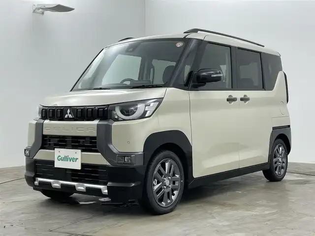 三菱 デリカミニ T プレミアム リミテッド ED 岡山県 2025(令7)年 0.1万km未満 ベージュⅡ 純正9インチディスプレイオーディオ/・型番：DA22JM/(BT/USB/Car play)/全周囲カメラ/ステアリングスイッチ/ステアリングヒーター/チルトステアリング/リアサンシェイド/シートバックテーブル/衝突軽減ブレーキ/レーダークルーズコントロール/レーンキープアシスト/オートハイビームアシスト/LEDヘッドライト/スマートキー×2/純正15インチAW/保証書/取扱説明書