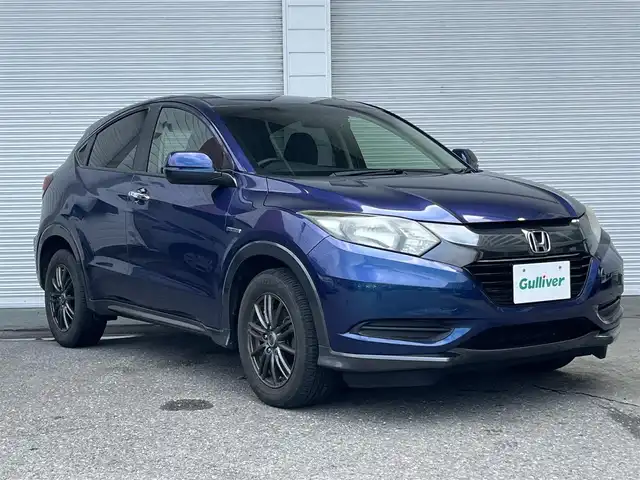 ホンダ ヴェゼル ハイブリッド 高知県 2015(平27)年 5.7万km モルフォブルーP 純正ナビ/　Bluetooth/ワンセグ/　CD/USB/AM/FM/バックカメラ/ドライブレコーダー/ETC/純正フロアマット/社外16インチアルミホイール/クルーズコントロール/プッシュスタート/スマートキー/MTモード付AT/横滑り防止装置/アイドリングストップ/盗難防止装置