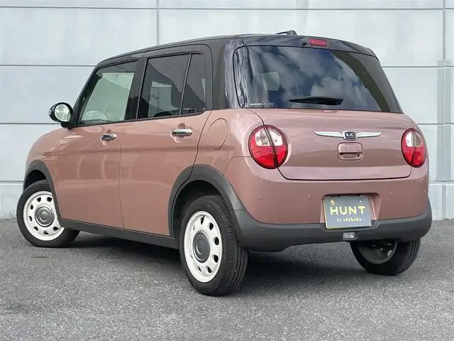 スズキ ラパン ＬＣ X 千葉県 2024(令6)年 0.4万km テラコッタピンクメタリック/アーバンブラウン 2トーン セーフティサポート/・衝突軽減ブレーキ/レーンキープアシスト/・コーナーセンサー(後)/誤発進誤後進抑制/・ふらつき警報/先行車発進お知らせ/・オートハイビーム/標識認識/純正7インチディスプレイオーディオ/・BT/USB/カープレイ/バックカメラ/ステアリングスイッチ/ナノイーX付エアコン/ツートンカラー革巻きステアリング/ハーフレザーシート(ブラウン)/シートヒーター(D/N席)/スマートキー/プッシュスタート/LEDヘッドライト/オートライト/アイドリングストップ/電動格納/ウィンカーミラー/純正フロアマット