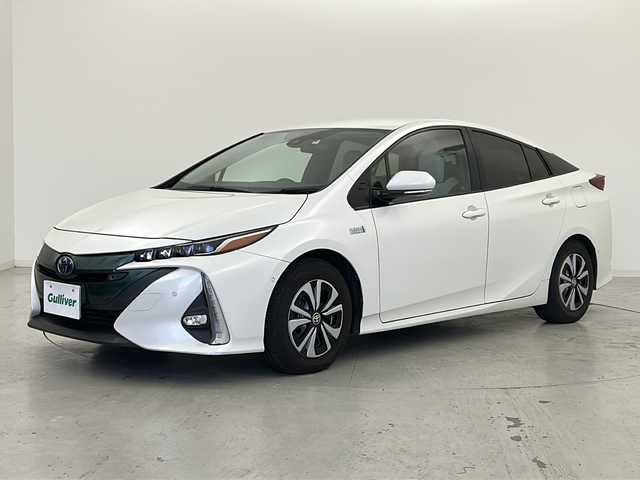 トヨタ プリウス ＰＨＶ A レザーパッケージ 宮城県 2018(平30)年 7.9万km ホワイトパールクリスタルシャイン 本革シート/Toyota Safety Sense /・プリクラッシュセーフティ/・レーンディパーチャーアラート/・オートマチックハイビーム/・レーダークルーズコントロール/インテリジェントパーキングアシスト/純正11インチナビ/・BT.USB.AUX/バックカメラ/フルセグTV/D席パワーシート/前席シートヒーター/ステアリングヒーター/ステアリングスイッチ/ビルトインETC2.0/ドライブレコーダー（F）/プッシュスタート/スマートキー/アイドリングストップ/LEDヘッドライト/LEDフォグライト/純正フロアマット/純正15インチAW/トノカバー/充電コード積込み