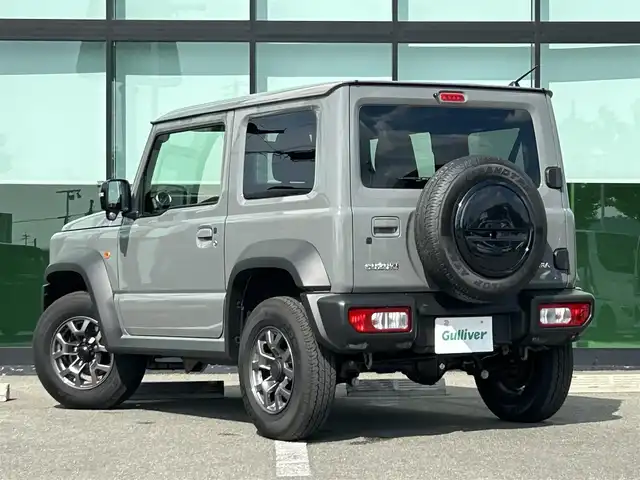 スズキ ジムニー シエラ JC 和歌山県 2025(令7)年 0.2万km ミディアムグレー 10インチディスプレイオーディオ/（Youtube/AppleCarPlay/AndroidAuto）/衝突軽減ブレーキ/レーンキープアシスト/横滑り防止機能/アイドリングストップ/コーナーセンサー/ダウンヒルアシストコントロール/シートヒーター/4WD/クルーズコントロール/LEDヘッドライト/オートライト/フォグランプ/ステアリングリモコン/プッシュスタート/スマートキー