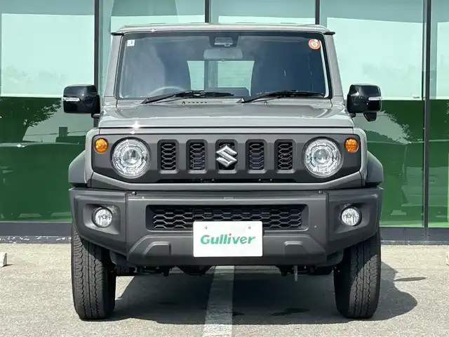 スズキ ジムニー シエラ JC 和歌山県 2025(令7)年 0.2万km ミディアムグレー 10インチディスプレイオーディオ/（Youtube/AppleCarPlay/AndroidAuto）/衝突軽減ブレーキ/レーンキープアシスト/横滑り防止機能/アイドリングストップ/コーナーセンサー/ダウンヒルアシストコントロール/シートヒーター/4WD/クルーズコントロール/LEDヘッドライト/オートライト/フォグランプ/ステアリングリモコン/プッシュスタート/スマートキー