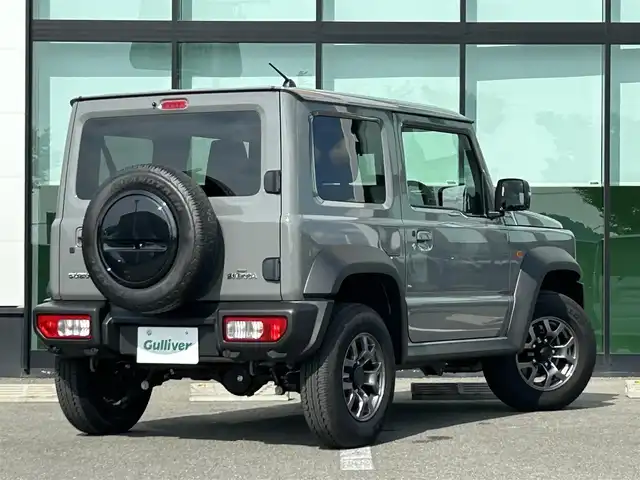 スズキ ジムニー シエラ JC 和歌山県 2025(令7)年 0.2万km ミディアムグレー 10インチディスプレイオーディオ/（Youtube/AppleCarPlay/AndroidAuto）/衝突軽減ブレーキ/レーンキープアシスト/横滑り防止機能/アイドリングストップ/コーナーセンサー/ダウンヒルアシストコントロール/シートヒーター/4WD/クルーズコントロール/LEDヘッドライト/オートライト/フォグランプ/ステアリングリモコン/プッシュスタート/スマートキー