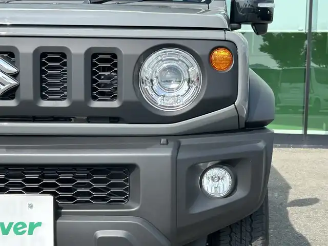 スズキ ジムニー シエラ JC 和歌山県 2025(令7)年 0.2万km ミディアムグレー 10インチディスプレイオーディオ/（Youtube/AppleCarPlay/AndroidAuto）/衝突軽減ブレーキ/レーンキープアシスト/横滑り防止機能/アイドリングストップ/コーナーセンサー/ダウンヒルアシストコントロール/シートヒーター/4WD/クルーズコントロール/LEDヘッドライト/オートライト/フォグランプ/ステアリングリモコン/プッシュスタート/スマートキー