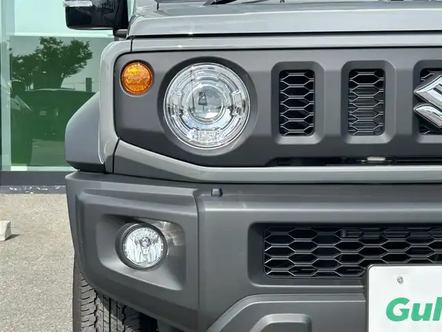 スズキ ジムニー シエラ JC 和歌山県 2025(令7)年 0.2万km ミディアムグレー 10インチディスプレイオーディオ/（Youtube/AppleCarPlay/AndroidAuto）/衝突軽減ブレーキ/レーンキープアシスト/横滑り防止機能/アイドリングストップ/コーナーセンサー/ダウンヒルアシストコントロール/シートヒーター/4WD/クルーズコントロール/LEDヘッドライト/オートライト/フォグランプ/ステアリングリモコン/プッシュスタート/スマートキー