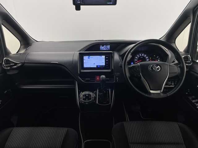 トヨタ ヴォクシー ZS 宮崎県 2019(令1)年 5万km ブラッキッシュアゲハガラスフレーク 社外メモリーナビ/CD　DVD　BTオーディオ　フルセグTV/バックカメラ/アルパインフリップダウンモニター/両側パワースライドドア/クルーズコントロール/ステアリングリモコン/プリクラッシュセーフティ/前後パーキングサポートブレーキ/前後クリアランスソナー/先行車発進告知/レーンディパーチャーアラート/オートLEDヘッドライト/LEDフォグライト/前後ドライブレコーダー/ビルトインETC