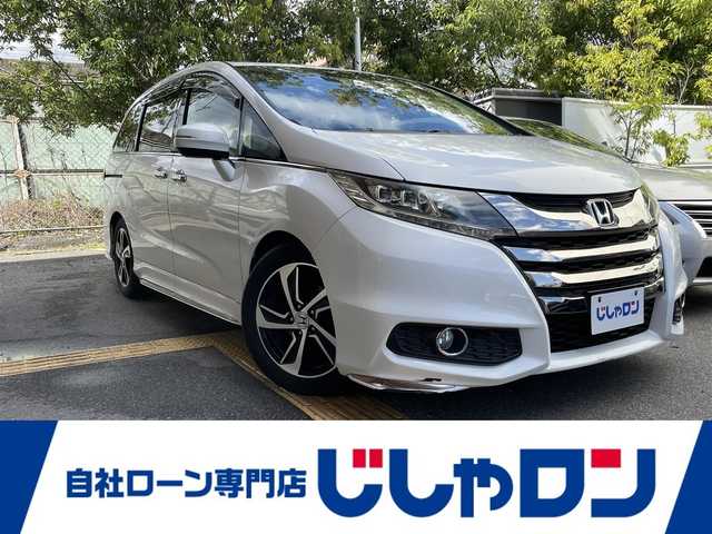ホンダ オデッセイ アブソルート 兵庫県 2014(平26)年 10.7万km ホワイトオーキッドパール (株)IDOMが運営する【じしゃロン西宮店】の自社ローン専用車両になります。こちらは現金またはオートローンご利用時の価格です。自社ローンご希望の方は別途その旨お申付け下さい/＊ETC/＊バックカメラ/＊パワステ/＊パワーウィンドウ/＊アイドリングストップ/＊フルセグ/＊USBあり/＊ハーフレザー/＊片側パワスラ/＊横滑り防止装置/＊オートライト/＊シティブレーキアクティブシステムあり