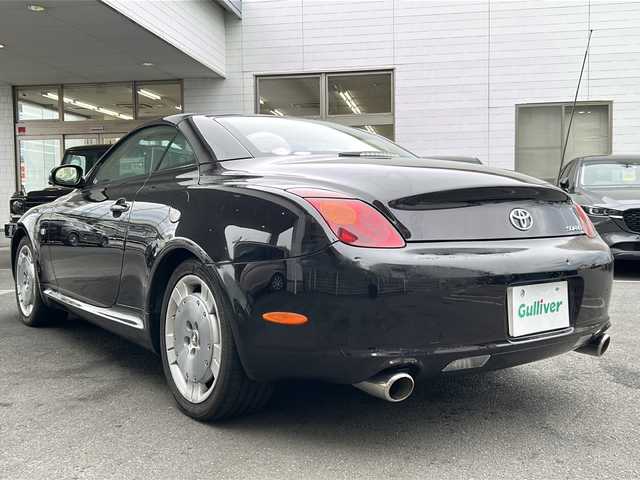 トヨタ ソアラ 430SCV 京都府 2004(平16)年 12.8万km ブラキッシュレッドマイカ 本革白シート　/ワンセグTV/純正ＡＷカバー付　/純正ＤＶＤナビ　/ＨＩＤヘッドライト　/クルーズコントロール　/Ｄ＋Ｎ席パワーシート　/Ｄ＋Ｎ席シートヒーター　/純正ＥＴＣ　/ＣＤ／ＣＤチェンジャー　/ＭＤ再生/電動ハンドル調整/フロントフォグランプ/盗難防止装置/Wエアバッグ