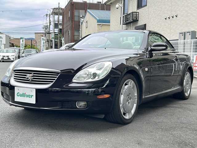 トヨタ ソアラ 430SCV 京都府 2004(平16)年 12.8万km ブラキッシュレッドマイカ 本革白シート　/ワンセグTV/純正ＡＷカバー付　/純正ＤＶＤナビ　/ＨＩＤヘッドライト　/クルーズコントロール　/Ｄ＋Ｎ席パワーシート　/Ｄ＋Ｎ席シートヒーター　/純正ＥＴＣ　/ＣＤ／ＣＤチェンジャー　/ＭＤ再生/電動ハンドル調整/フロントフォグランプ/盗難防止装置/Wエアバッグ
