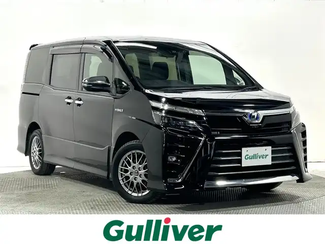 トヨタ ヴォクシー ハイブリッド ZS 煌 大阪府 2018(平30)年 4.8万km ブラック 純正10incナビ(フルセグ/DVD再生/Bluetooth) バックカメラ 後席モニター ETC 両側パワースライドドア 衝突軽減 クルコン トヨタセーフティセンス シートヒーター ドラレコ