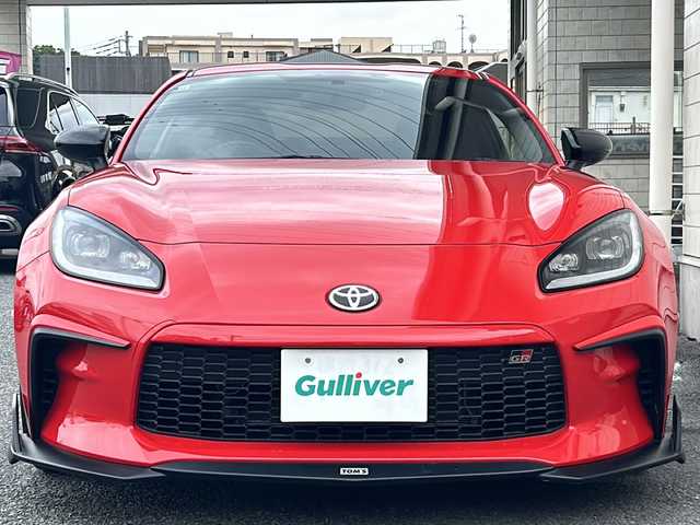 トヨタ ＧＲ８６ RZ 神奈川県 2021(令3)年 1.4万km 赤 6速MT/TOM‘Sパッケージカー/・フロントディフューザー/・サイドディフューザー/・リアアンダーディフューザー/・トランクリッドスポイラー/・フロントバンパーガーニッシュ/・フロントノーズ/・トムスバレル/・トムスマフラー/純正ディーラーナビ(CD/SD/AUX/BT/ワンセグTV)/バックカメラ/クルーズコントロール/ハーフレザーシート/D/N席シートヒーター/ETC/前方ドライブレコーダー/オートライト/純正フロアマット/スペアキー×1/保証書/取扱説明書