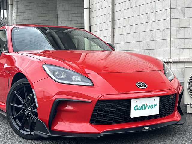 トヨタ ＧＲ８６ RZ 神奈川県 2021(令3)年 1.4万km 赤 6速MT/TOM‘Sパッケージカー/・フロントディフューザー/・サイドディフューザー/・リアアンダーディフューザー/・トランクリッドスポイラー/・フロントバンパーガーニッシュ/・フロントノーズ/・トムスバレル/・トムスマフラー/純正ディーラーナビ(CD/SD/AUX/BT/ワンセグTV)/バックカメラ/クルーズコントロール/ハーフレザーシート/D/N席シートヒーター/ETC/前方ドライブレコーダー/オートライト/純正フロアマット/スペアキー×1/保証書/取扱説明書