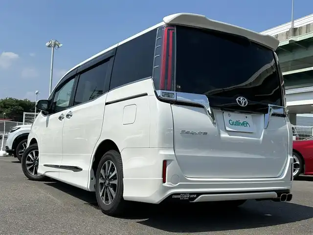 トヨタ エスクァイア Gi 愛知県 2018(平30)年 2.6万km ホワイトパールクリスタルシャイン モデリスタエアロ（F・S・R）/純正9インチSDナビ/フルセグTV/BT/HDMI/バックカメラ/純正フリップダウンモニター/ビルトインETC/純正15インチAW/トヨタセーフティセンス/クルーズコントロール/前後ドライブレコーダー/両側パワースライドドア /レザーシート/前席シートヒーター/純正フロアマット/取説、保証書/スペアキー