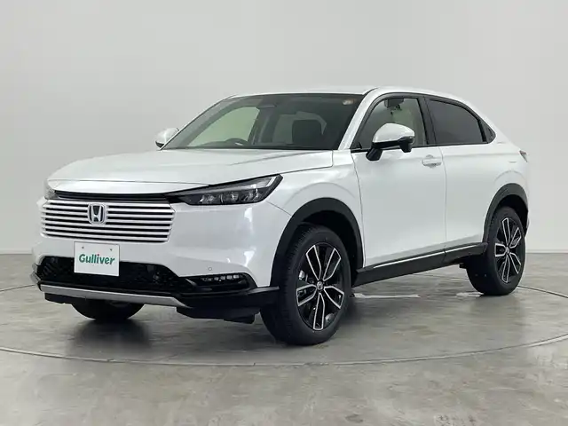 ホンダ ヴェゼル ハイブリッド e:HEV Z 群馬県 2025(令7)年 0.1千km プラチナホワイトパール 登録済未使用車　純正９型ナビ　バックカメラ　電動リアゲート　ハーフレザー　シートヒーター　ハンドルヒーター　置くだけ充電　アダプティブクルーズコントロール　ＢＳＭ　ＥＴＣ２．０　ＬＥＤライト　禁煙車