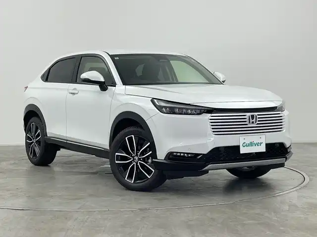 ホンダ ヴェゼル ハイブリッド e:HEV Z 群馬県 2025(令7)年 0.1千km プラチナホワイトパール 登録済未使用車　純正９型ナビ　バックカメラ　電動リアゲート　ハーフレザー　シートヒーター　ハンドルヒーター　置くだけ充電　アダプティブクルーズコントロール　ＢＳＭ　ＥＴＣ２．０　ＬＥＤライト　禁煙車