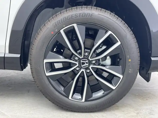 ホンダ ヴェゼル ハイブリッド e:HEV Z 群馬県 2025(令7)年 0.1千km プラチナホワイトパール 登録済未使用車　純正９型ナビ　バックカメラ　電動リアゲート　ハーフレザー　シートヒーター　ハンドルヒーター　置くだけ充電　アダプティブクルーズコントロール　ＢＳＭ　ＥＴＣ２．０　ＬＥＤライト　禁煙車
