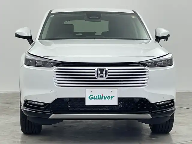 ホンダ ヴェゼル ハイブリッド e:HEV Z 群馬県 2025(令7)年 0.1千km プラチナホワイトパール 登録済未使用車　純正９型ナビ　バックカメラ　電動リアゲート　ハーフレザー　シートヒーター　ハンドルヒーター　置くだけ充電　アダプティブクルーズコントロール　ＢＳＭ　ＥＴＣ２．０　ＬＥＤライト　禁煙車