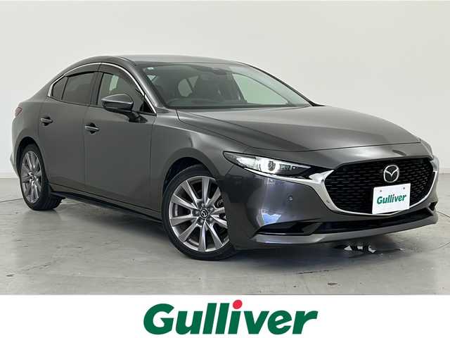 マツダ マツダ３セダン XD Lパッケージ 宮城県 2019(令1)年 7.4万km マシーングレープレミアムM i-ACTIVSENSE/・衝突被害軽減ブレーキ/・車線逸脱警報システム/・アダプティブクルーズコントロール/・パーキングセンサー/・ハイビームアシスト/・ブラインドスポットモニター/・ヘッドアップディスプレイ/純正ナビ/・フルセグTV/・BT.CD/DVD.HDMI/本革シート/・D席パワーシート/・前席シートヒーター/ETC/ステアリングスイッチ/・パドルシフト/・ステアリングヒーター/プッシュスタート/スマートキー×2/電動パーキングブレーキ/横滑り防止/LEDヘッドライト/純正18インチAW/純正フロアマット