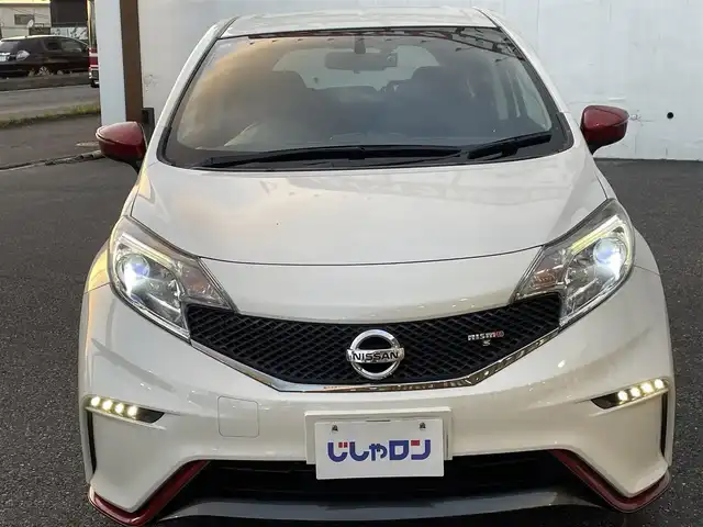 日産 ノート ニスモS 千葉県 2015(平27)年 10.6万km ブリリアントホワイトパール (株)IDOMが運営する【じしゃロン八千代店】の自社ローン対象車両になります。こちらは現金またはオートローンご利用時の価格です。自社ローンご希望の方は別途その旨お申付け下さい/ETC/エンジンスタートボタン/MT車/スマートキー