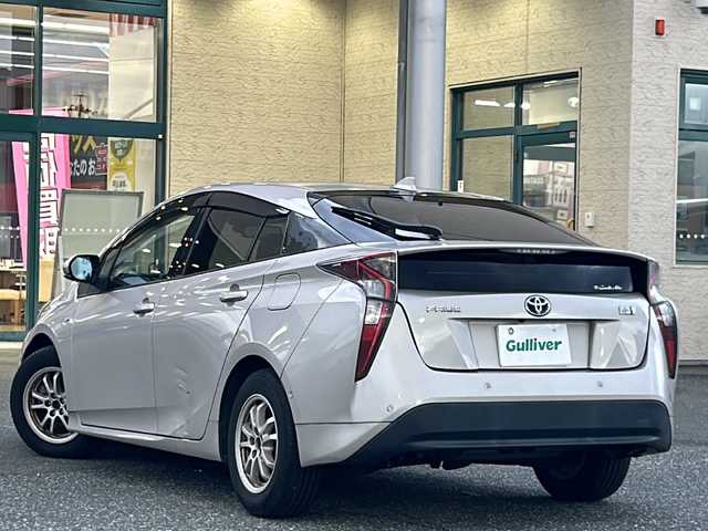 トヨタ プリウス A 愛知県 2016(平28)年 11.5万km スティールブロンドM 登録時走行距離114381km/ワンオーナー/純正9インチメモリナビ/（Bluetooth/フルセグTV/DVD/AM/FM)/バックカメラ/インテリジェントクリアランスソナー/サンルーフ/トヨタセーフティーセンス/プリクラッシュセーフティー/レーンディパーチャーアラート/ブラインドスポットモニター/インテリジェントパーキングアシスト/ヘッドアップディスプレイ/オートマッチハイビーム/純正ドアバイザー/純正フロアマット/ビルドインETC/テレビキャンセラー/スマートキー/（スペアキー×１）/保証書