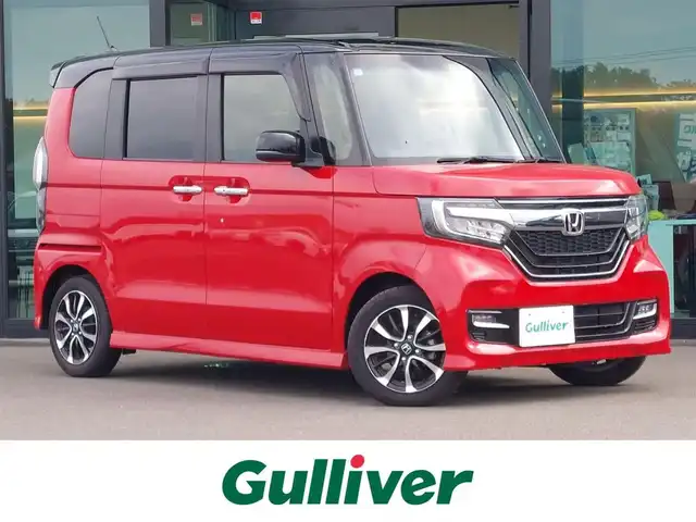 ホンダ Ｎ ＢＯＸ カスタム G L ホンダセンシング 東京都 2019(令1)年 2.4万km ミラノレッド 社外ナビ(DVIC-RZ710)/【DISC/MSV/SD/FM/AM/TV/BT/ipod/USB// HDMI/AUX】/バックカメラ/ビルトインETC/ドライブレコーダー/アダプティブクルーズコントロール/片側電動スライドドア/衝突軽減ブレーキ/LKAS/横滑り防止装置/後席サンシェード/USBポート/LEDヘッドライト/フォグランプ/純正14インチAW/プッシュスタート/スマートキー