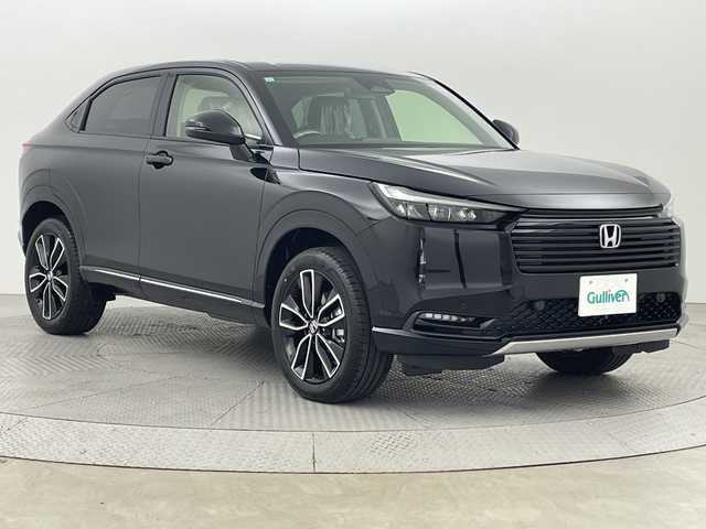 ホンダ ヴェゼル ハイブリッド e:HEV Z 新潟県 2025(令7)年 0.1千km クリスタルブラックパール ホンダセンシング/ワイヤレス充電器/シーケンシャルウィンカー/純正ナビ/　フルセグTV/Bluetooth/AppleCarPlay/AndroidAuto/バックカメラ/パワーバックドア/フットオープナー/レーダークルーズコントロール/LEDオートライト/ハーフレザーシート/シートヒーター/純正18インチアルミホイール/パドルシフト/ブラインドスポットモニター/ステアリングリモコン/ステアリングヒーター/ビルトインETC2.0