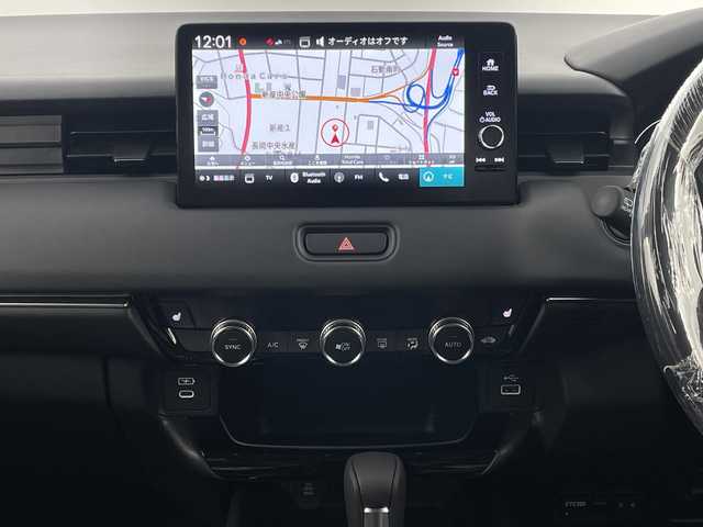 ホンダ ヴェゼル ハイブリッド e:HEV Z 新潟県 2025(令7)年 0.1千km クリスタルブラックパール ホンダセンシング/ワイヤレス充電器/シーケンシャルウィンカー/純正ナビ/　フルセグTV/Bluetooth/AppleCarPlay/AndroidAuto/バックカメラ/パワーバックドア/フットオープナー/レーダークルーズコントロール/LEDオートライト/ハーフレザーシート/シートヒーター/純正18インチアルミホイール/パドルシフト/ブラインドスポットモニター/ステアリングリモコン/ステアリングヒーター/ビルトインETC2.0