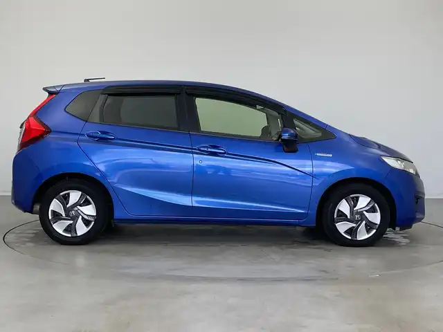 ホンダ フィット ハイブリット Lパッケージ 新潟県 2014(平26)年 8.6万km ブリリアントスポーティブルーメタリック2トーン 純正ナビTV/（CD/DVD/Bluetooth/フルセグTV/AM/FM/HDMI)/純正バックカメラ/社外ドライブレコーダー（VREC-DZ300）/純正LEDオートライト/純正フロアマット/クルーズコントロール/オートエアコン/ドアバイザー/ビルトインETC/スマートキー/プッシュエンジンスタート/スペアキー/純正フロアマット/LEDフォグランプ