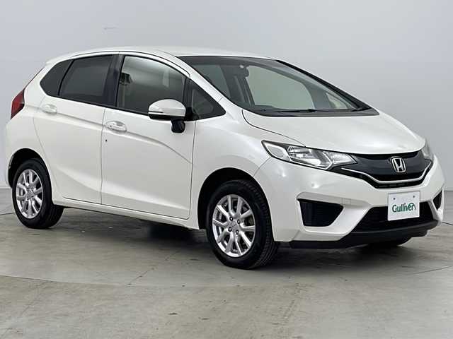ホンダ フィット 13G Fパッケージ 道央・札幌 2013(平25)年 11.6万km プレミアムホワイトパール ・純正ナビＴＶ、ＢＴ、ＤＶＤ、ＣＤ/・バックカメラ/・アイドリングストップ/・横滑り防止機能/・電動格納ミラー/・ドアミラーウィンカー・ヒーター付/・フロントワイパーデアイサー/・純正リモコンスターター/・スマートキー/・ワンオーナー