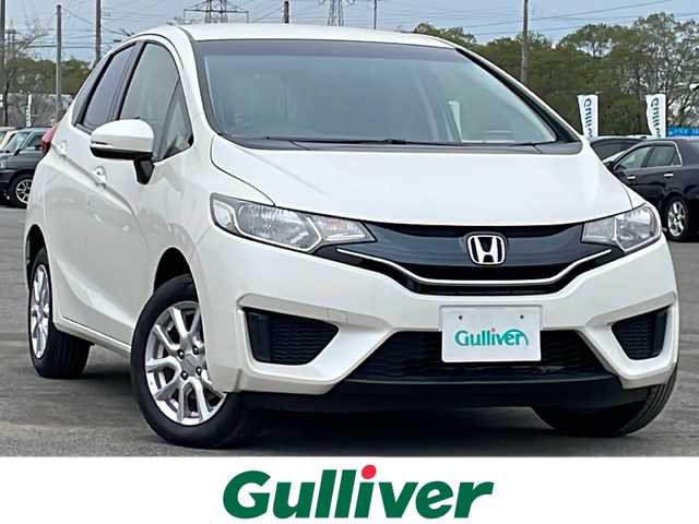ホンダ フィット 13G Fパッケージ 道央・札幌 2013(平25)年 11.6万km プレミアムホワイトパール ４WD/ワンオーナー/純正ディーラーOPナビ/CD/DVD/BT/フルセグ/横滑り防止装置/バックカメラ/ETC/アイドリングストップ/ECONモード/ワイパーデアイサー/ステアリングリモコン/プッシュスタート/スマートキー/ハロゲンヘッドライト/ヘッドライトレベライザー/電動格納ミラー/ヒーテッドドアミラー/ウィンカーミラー/純正フロアマット/スペアキー/純正エンジンスターター