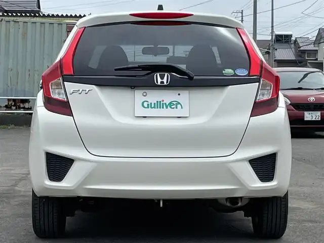 ホンダ フィット 13G Fパッケージ 道央・札幌 2013(平25)年 11.6万km プレミアムホワイトパール ４WD/ワンオーナー/純正ディーラーOPナビ/CD/DVD/BT/フルセグ/横滑り防止装置/バックカメラ/ETC/アイドリングストップ/ECONモード/ワイパーデアイサー/ステアリングリモコン/プッシュスタート/スマートキー/ハロゲンヘッドライト/ヘッドライトレベライザー/電動格納ミラー/ヒーテッドドアミラー/ウィンカーミラー/純正フロアマット/スペアキー/純正エンジンスターター