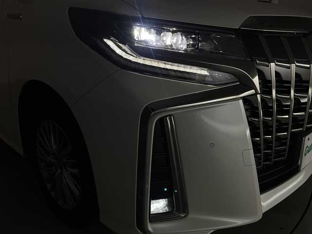 トヨタ アルファードハイブリット S タイプゴールド 群馬県 2021(令3)年 0.5万km ホワイトパールクリスタルシャイン 純正9インチディスプレイオーディオ/・AM/FM/USB/Bluetooth/Miracast/純正フリップダウンモニター/トヨタセーフティセンス/・プリクラッシュセーフティシステム/・レーントレーシングアシスト/・アダプティブハイビームシステム/・レーダークルーズコントロール(全車速追従機能付)/・ロードサインアシスト/バックカメラ/パワーバックドア/両側パワースライドドア/プッシュスタート/スマートキー