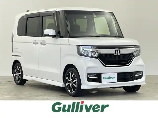 ホンダ Ｎ ＢＯＸ カスタム G L ホンダセンシング 千葉県 2020(令2)年 1.8万km プラチナホワイトパール Gathers純正ナビ/フルセグTV　Bluetooth　CD　DVD/バックカメラ/ビルトインETC/ホンダセンシング/・衝突軽減ブレーキ/・誤発進抑制機能/・先行車発進お知らせ機能/・アダプティブクルーズコントロール/リアコーナーセンサー/オートリトラミラー/オートライト/片側パワースライドドア/前席シートヒーター/純正アルミホイール/ステアリングスイッチ/リアサンバイザー/電動格納ミラー/スマートキー/プッシュスタート