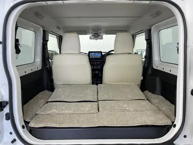 スズキ ジムニー シエラ JC 群馬県 2022(令4)年 2.5万km ピュアホワイトP 4WD/5速MT/社外9インチSDナビ/フルセグTV/CD/DVD/BT/USB/AUX/SD/バックカメラ/デュアルセンサーブレーキサポート/誤発進抑制機能/車線逸脱警報/標識認識機能/ふらつき警報機能/先行車発進お知らせ機能/オートマチックハイビーム/ヘッドライトウォッシャー/前席シートヒーター/ETC/革巻きステアリング/ステアリングスイッチ/LEDヘッドライト/プッシュスタート/スマートキー