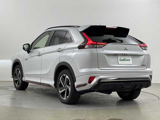 三菱 エクリプス クロス ＰＨＥＶ P 道央・札幌 2021(令3)年 3.1万km ホワイトダイヤモンド ・４WD/PHEV/・電動パノラマサンルーフ/・スポイラーパッケージOP/・スタイリングパッケージOP/・衝突被害軽減ブレーキシステム/・レーダークルーズコントロール/・オートマチックハイビーム[AHB]/・純正ディスプレイオーディオ/・Bluetooth.APPS.フルセグ/・全方位カメラ/バックカメラ/・レザーシート/パワーシート/・全席シートヒーター/・AC100V1500W/・コーナーセンサー/・パドルシフト/ステアリングヒーター/・充電コード