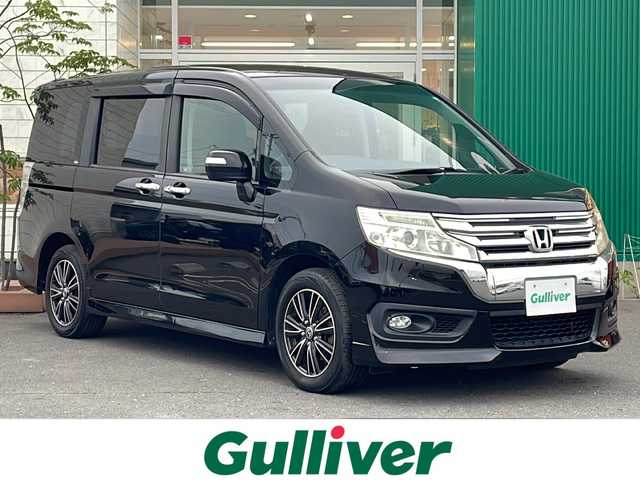 ホンダ ステップワゴン スパーダ Z 青森県 2013(平25)年 8.1万km プレミアムスパークルブラックパール 4WD/純正9インチナビ・フルセグTV/CD・DVD・Bluetooth・SD/バックカメラ/両側パワースライドドア/横滑り防止機能/パドルシフト/ワイパーデアイサー/ビルトインETC/純正エンジンスターター/HIDヘッドライト/フォグライト/ウインカーミラー/社外16インチアルミホイール/スマートキー