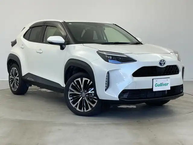 トヨタ ヤリスクロス ハイブリッド Z 新潟県 2021(令3)年 5.5万km ホワイトパールクリスタルシャイン メーカー純正ディスプレイオーディオ/ナビキット/(Fm.AM.Bluetooth.ミラキャスト)/バックカメラ/トヨタセーフティセンス/・プリクラッシュセーフティ/・レーンキープアシスト/・レーダークルーズコントロール/・オートマチックハイビーム/革巻きステアリング/ステアリングリモコン/LEDオートライト/電動格納ウィンカーミラー/前後ドライブレコーダー/電子制御パーキングブレーキ/ブレーキホールド/プッシュスタート/スマートキー×2/純正フロアマット