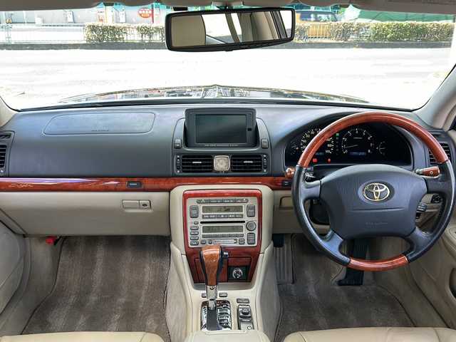 トヨタ オリジン 兵庫県 2000(平12)年 2.6万km ブルーマイカ 登録時走行距離25791km/1000台限定車/純正ナビ/バックカメラ/革シート/前席シートヒーター/前席パワーシート/本木製/革巻きステアリング/クルーズコントロール/オートライト/純正15インチAW/１６，１７，１９，２２，２４，２６，２８，３０，Ｒ２，Ｒ４，Ｒ６記録簿有