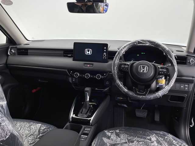 ホンダ ヴェゼル ハイブリッド e:HEV Z 長野県 2025(令7)年 0.1千km クリスタルブラックパール 登録済未使用車/純正メモリナビ/（フルセグTV＆Bluetooth＆USB＆AppleCarPlay＆AndroidAuto＆FM・AM）/バックカメラ/ホンダセンシング/・クルーズコントロール（追従あり）/・レーンキープアシスト/・衝突被害軽減システム/・踏み間違い衝突軽減ブレーキ/・BSM/・クリアランスソナー/ワイヤレス充電/ビルトインETC2.0/ダウンヒルアシストコントロール/ステアリングヒーター/ステアリングスイッチ/シートヒーター（前席）/LEDヘッドライト/オートマチックハイビーム/フォグランプ/スマートキー/スペアキー1本/保証書/取扱説明書