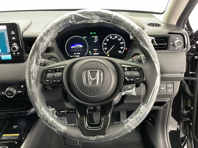 ホンダ ヴェゼル ハイブリッド e:HEV Z 長野県 2025(令7)年 0.1千km クリスタルブラックパール 登録済未使用車/純正メモリナビ/（フルセグTV＆Bluetooth＆USB＆AppleCarPlay＆AndroidAuto＆FM・AM）/バックカメラ/ホンダセンシング/・クルーズコントロール（追従あり）/・レーンキープアシスト/・衝突被害軽減システム/・踏み間違い衝突軽減ブレーキ/・BSM/・クリアランスソナー/ワイヤレス充電/ビルトインETC2.0/ダウンヒルアシストコントロール/ステアリングヒーター/ステアリングスイッチ/シートヒーター（前席）/LEDヘッドライト/オートマチックハイビーム/フォグランプ/スマートキー/スペアキー1本/保証書/取扱説明書
