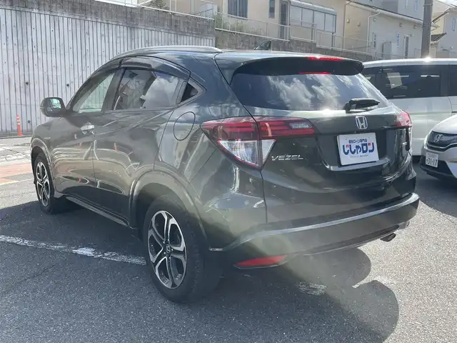 ホンダ ヴェゼル ハイブリッド Z 福岡県 2014(平26)年 10.6万km ミスティックグリーンパール (株)IDOMが運営する【じしゃロン八幡西店】の自社ローン専用車両になります。こちらは現金またはオートローンご利用時の価格です。自社ローンご希望の方は別途その旨お申付け下さい/スマートキー/純正ナビ/フルセグ/Bluetooth/バックカメラ/ハーフレザーシート/シートヒーター/クルーズコントロール/パドルシフト/LEDヘッドライト/オートライト