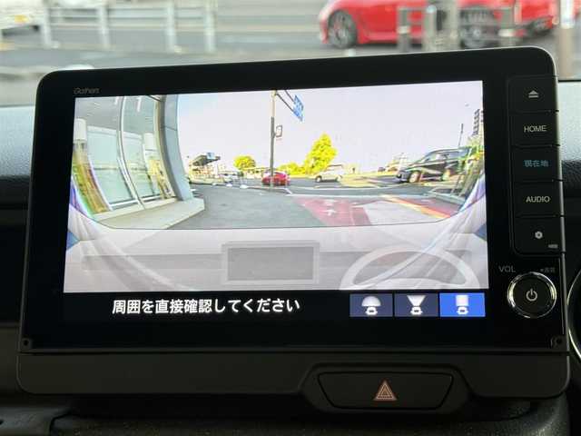 ホンダ Ｎ ＢＯＸ カスタム 香川県 2024(令6)年 1.4万km プレミアムサンライトホワイトパール ワンオーナー/純正9インチコネクトナビ/【フルセグ/CD/DVD/BT】/バック/フロントカメラ/ホンダセンシング/レーダークルーズコントロール/両側パワースライドドア/LEDヘッドライト/衝突被害軽減システム/前後コーナーセンサー/レーンキープアシスト/オーバーヘッドコンソール/革調シートカバー/シートバックテーブル/スマートキー/ビルトインETCウィンカーミラー