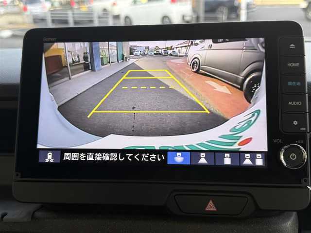ホンダ Ｎ ＢＯＸ カスタム 香川県 2024(令6)年 1.4万km プレミアムサンライトホワイトパール ワンオーナー/純正9インチコネクトナビ/【フルセグ/CD/DVD/BT】/バック/フロントカメラ/ホンダセンシング/レーダークルーズコントロール/両側パワースライドドア/LEDヘッドライト/衝突被害軽減システム/前後コーナーセンサー/レーンキープアシスト/オーバーヘッドコンソール/革調シートカバー/シートバックテーブル/スマートキー/ビルトインETCウィンカーミラー
