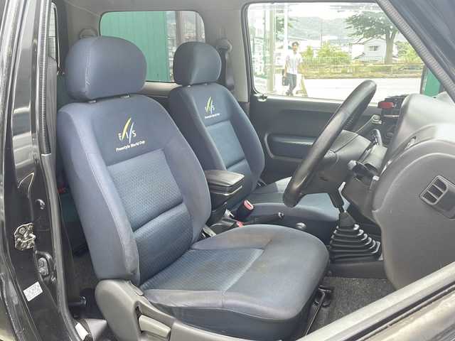 スズキ ジムニー FISフリースタイルワールドC LTD 京都府 2004(平16)年 10.5万km ブルーイッシュブラックパール3 ４WD/ターボ/5速マニュアル/社外HDDナビ/リフトアップ/社外マフラー/ETC/リモコンキー/社外16インチアルミ/革巻きステアリング