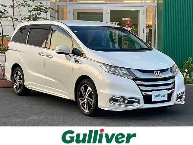 ホンダ オデッセイ アブソルート・EXホンダセンジング 青森県 2016(平28)年 10.3万km ホワイトオーキッドパール 4WD/純正8インチナビ・フルセグTV/CD・DVD・Bluetooth・SD/バックカメラ/合皮コンビシート/運転席パワーシート/衝突軽減ブレーキ/追従クルーズコントロール/レーンキープアシスト/ブラインドスポットインフォメーション/パドルシフト/2列目ロールサンシェード/純正エンジンスターター/ビルトインETC/電光スカッフプレート/LEDヘッドライト/フォグランプ/純正17インチアルミ