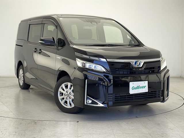 トヨタ ヴォクシー ハイブリッド V 千葉県 2020(令2)年 1.5万km ブラック 純正ナビ/　CD/DVD/Bluetooth/フルセグTV/トヨタセーフティセンス/クルーズコントロール/レーンキープアシスト/衝突軽減ブレーキ/クリアランスソナー/先行車発進警報/オートハイビーム/純正フリップダウンモニター/バックドアイージークローズ/ビルトインETC2.0/前方ドラレコ/前席シートヒーター/LEDヘッドライト/バックカメラ