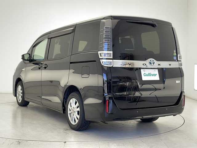 トヨタ ヴォクシー ハイブリッド V 千葉県 2020(令2)年 1.5万km ブラック 純正ナビ/　CD/DVD/Bluetooth/フルセグTV/トヨタセーフティセンス/クルーズコントロール/レーンキープアシスト/衝突軽減ブレーキ/クリアランスソナー/先行車発進警報/オートハイビーム/純正フリップダウンモニター/バックドアイージークローズ/ビルトインETC2.0/前方ドラレコ/前席シートヒーター/LEDヘッドライト/バックカメラ